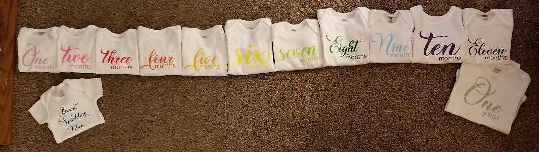 Colorful monthly onsies