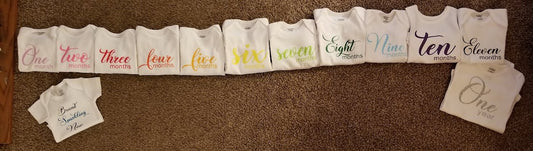 Colorful monthly onsies